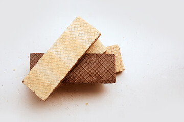 Four Russian checkered waffles different colors on white. sweet dessert