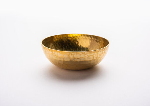 Empty Crockery - New Brass Or Gold Bowl Over White Background