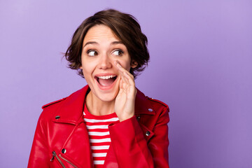 Obraz na płótnie Canvas Photo of young woman happy smile hand near mouth tell speak gossip rumor look empty space isolated over purple color background