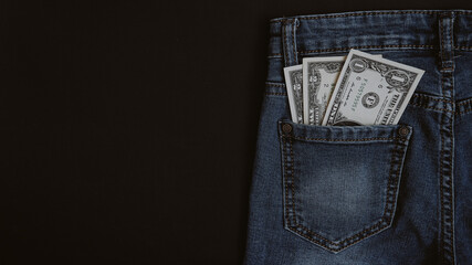 dollars in jeans pocket