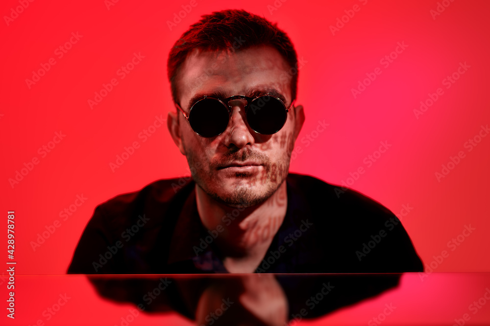 Wall mural brutal man in sunglasses