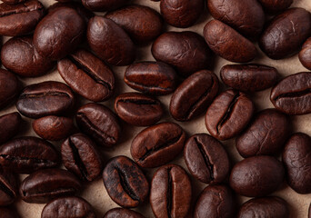 Roasted coffee beans like a background for wallpaper or decor