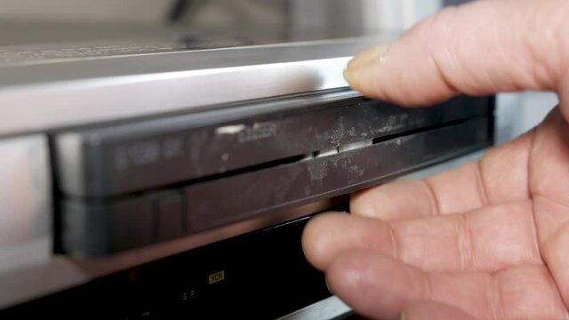 Old appliances, ejected of video tape in vhs player