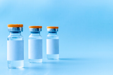 Vaccine vials. Covid vaccine in bottles. Vaccination concept