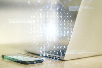 Double exposure of creative code skull hologram on laptop background. Malware and cyber crime...