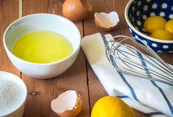 Egg yolk and egg white and whisk before beating