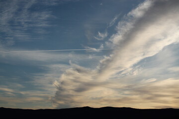 Beautiful and relaxing evening sky with airplane mark 