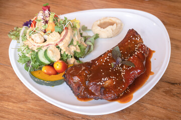 bbq rack steak eat with vegetable salad
