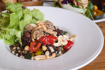 fried brown rice with nuts - vegan food