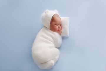 Newborn baby boy sleep on blue blanket. Cute sleeping newborn
