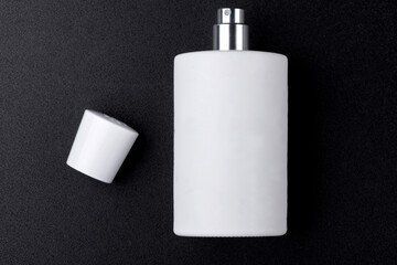 perfume bottle mock up on dark blank background. View from above. Horizontal