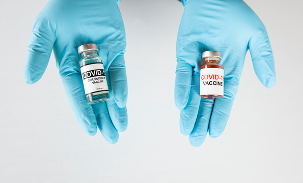 Two Different Variants Of Covid Vaccines In The Nurse's Hands