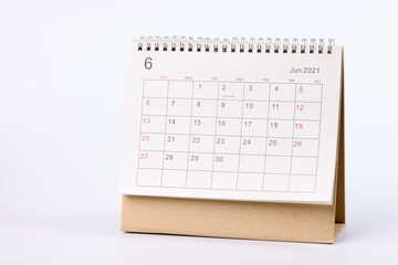 Applied paper calendar standing on white background