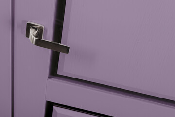 Modern style bronze door handle on violet wooden door