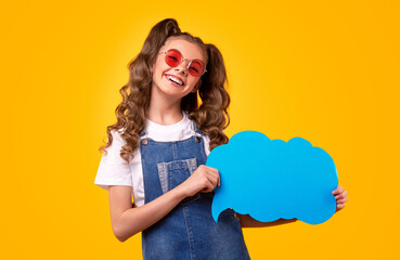 Trendy girl showing blank speech bubble