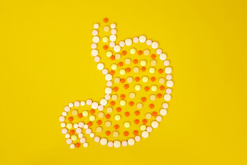 Stomach pills, food poisoning, toxins in the body. The concept of indigestion and abdominal pain.