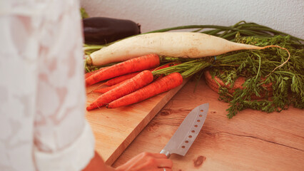 Young woman cooking in the kitchen. Young woman