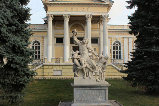 Odessa, Ukraine - December 16, 2017: Copy of the famous sculptural group Laocoon and His Sons in front of the Odessa Archaeological Museum, founded in 1825.