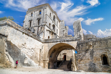 Montmajour Abbey near Arles, France, low angle view. Abbey is former medieval fortified monastery, now historical monument. 