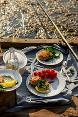 Fish patties fishing near the river. Daylight