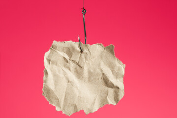 blank piece of paper on a fishhook