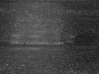 Fototapeta premium texture of wet black asphalt road after rain