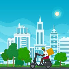 Young african guy in protective face mask with box for food delivery rides a gray scooter on a summer background of green trees and cities, online delivery service and stay home concept