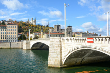 Lyon, France - October 25, 2020: View of The Pont de la Tournelle (Tournelle Bridge) through Rhone river