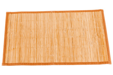 Bamboo straw serving mat isolated over white background.