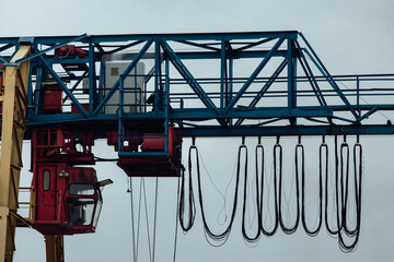 the cabin of a gantry crane for transporting goods in the factory. automated control of the weight loader
