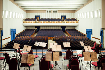 view of the empty concert hall from the stage. on the stage there are chairs and instruments for the musicians. preparation of the philharmonic for the performance of the famous orchestra © evgavrilov