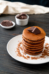 chocolate pancake stack on plate