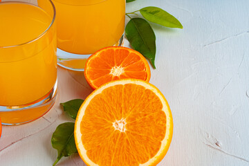 Orange juice cup on table close up