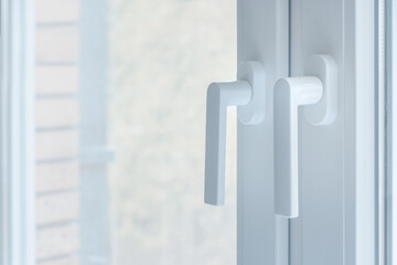PVC window handles, selective focus