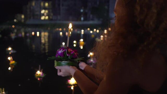 Loy Krathong Bangkok,travels Thailand Festival,Foreign tourists buddhist temple show respect and thank to the Goddess of water.