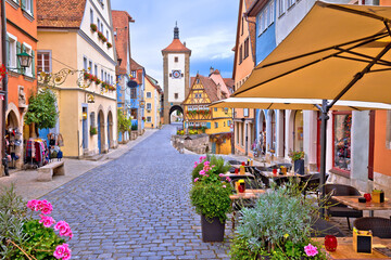 Fototapeta na wymiar Famous Plonlein gate and cobbled street of historic town of Rothenburg ob der Tauber view