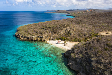 Aerial view above scenery of Curacao, Caribbean with ocean, coast and beach
