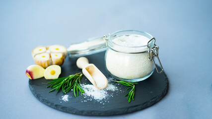 Spices for cooking. Herbal salt, garlic, rosemary
