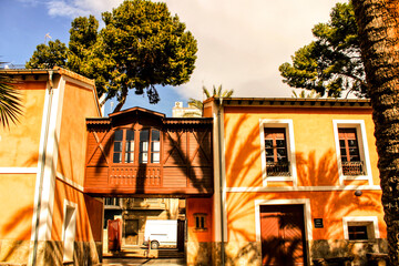 Typical and colorful house in a palm orchard in Elche, Spain