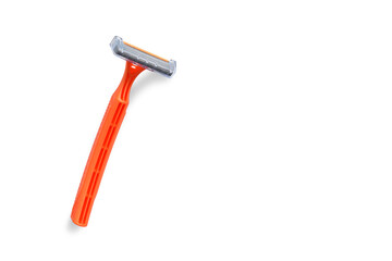 Disposable shaving razor orange on white isolated background