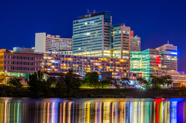 View of the UNO city complex including VIC,UN headquarters and a riverside promenade full of bars...