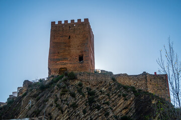 Views from below to the tower of the castle of Sot de Chera, Valencia (Spain).