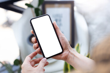 cell phone blank white screen mockup.woman hand holding texting using mobile on desk at office.background empty space for advertise.work people contact marketing business,technology