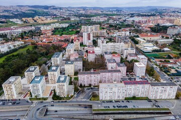 Aerial view of Benfica residential district at twilight, view of white building, Lisbon, Portugal.