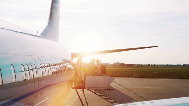 Airplane at the sunset in 4k slow motion 60fps
