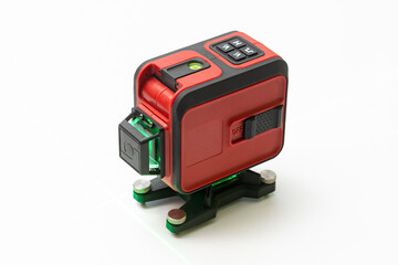 Construction laser level on a light gray background