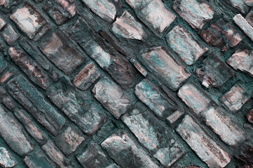 stone background. creative gray texture. colored mosaic. wall made of slabs. brick wall in loft style
