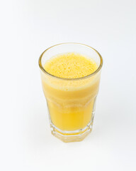 a glass of orange fresh on a white background
