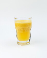 a glass of orange fresh on a white background