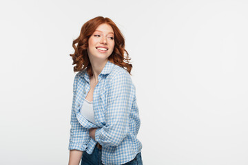 positive young woman in checkered shirt isolated on white.